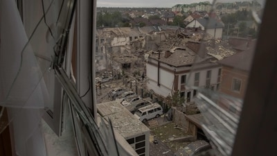 A view through a destroyed window shows the site of heavily damaged residential buildings following a Russian air attack on the outskirts of Kyiv, on September 28, 2025, (AFP) A view through a destroyed window shows the site of heavily damaged residential buildings following a Russian air attack on the outskirts of Kyiv, on September 28, 2025, (AFP)
