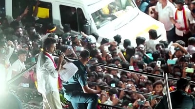 TVK (Tamilaga Vettri Kazhagam) chief and actor Vijay addresses a gathering before a stampede during a public event, in Karur on Saturday. (ANI)