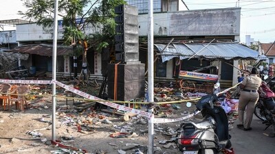 A general view shows scattered shoes after a stampede that broke out last evening during a political rally in the Karur district, which took the lives of at least 40 people. (AFP)