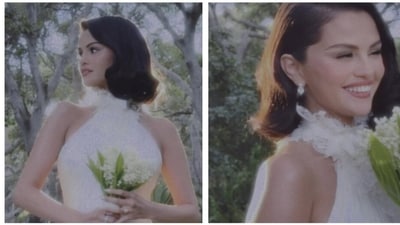 Selena wore a custom Ralph Lauren wedding gown featuring a high-neck, halter design with a structured bodice cinched at the waist, adorned with delicate floral lace detailing. Selena wore a custom Ralph Lauren wedding gown featuring a high-neck, halter design with a structured bodice cinched at the waist, adorned with delicate floral lace detailing.