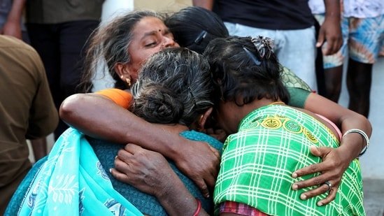 Relatives of the victims mourn in front of Karur Government Medical College hospital following a stampede incident at a rally held by Tamilaga Vettri Kazhagam party, in Karur.(Reuters)