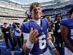New York Giants quarterback Jaxson Dart on the field after defeating the Los Angeles Chargers in an NFL football game. New York Giants quarterback Jaxson Dart on the field after defeating the Los Angeles Chargers in an NFL football game.