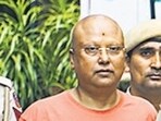 Police with the accused Chaitanyananda Saraswati at Vasant Kunj police station in New Delhi.