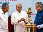 Kerala Governor Rajendra Arlekar, Chief Minister Pinarayi Vijayan and Congress MP Shashi Tharoor during the release of the inaugural edition of Rajahams on Sunday. (PTI)