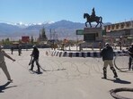 Security personnel block a road with razor wire amid curfew, days after violence during protests for Ladakh statehood, in Leh.
