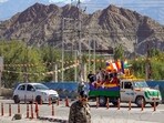 Mortal remains of 46-year-old ex-serviceman Tsewang Tharchin, a Kargil War veteran who was killed in violence during recent protests for Ladakh statehood, being taken for his last rites amid curfew in Leh on Monday, September 29, 2025.