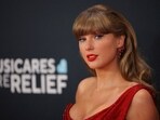 Taylor Swift poses at the red carpet during the 67th Annual Grammy Awards in Los Angeles
