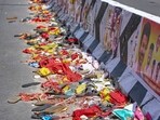 Footwear and other belongings of people lie on a road in the aftermath of stampede during a rally of actor and Tamilaga Vetri Kazhagam (TVK) chief Vijay, in Karur district, Tamil Nadu Footwear and other belongings of people lie on a road in the aftermath of stampede during a rally of actor and Tamilaga Vetri Kazhagam (TVK) chief Vijay, in Karur district, Tamil Nadu