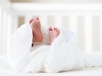 Newborn baby girl left in cardboard box on road side in Philippines