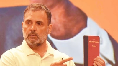 Rahul Gandhi holding up the red-and-black pocket-book edition of the Constitution of India at a recent event in Delhi. (HT File Photo) Rahul Gandhi holding up the red-and-black pocket-book edition of the Constitution of India at a recent event in Delhi. (HT File Photo)