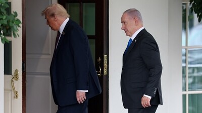 US President Donald Trump leads Israeli Prime Minister Benjamin Netanyahu into the White House in Washington, DC, on September 29, 2025. (Reuters)
