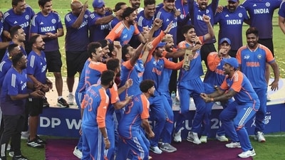 Indian team celebrates on the podium without the trophy after winning the Asia Cup in Dubai on Sunday. (AFP) Indian team celebrates on the podium without the trophy after winning the Asia Cup in Dubai on Sunday. (AFP)