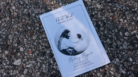 The day's program for the church service is seen fallen on the ground near a family reunification area in Grand Blanc Trillium following the shooting at a the church on Sunday.(Jeff Kowalsky/AFP)