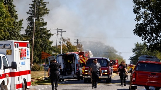 Smoke rises as emergency personnel work at the scene of a shooting which took place at the Church of Jesus Christ of Latter-day Saints, according to police, in Grand Blanc, Michigan, U.S., September 28, 2025. REUTERS/Rebecca Cook(REUTERS)