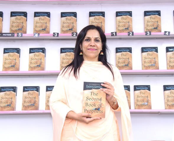 IAS Officer and translator Ministhi S with a copy of Benyamin’s The Second Book of Prophets (Courtesy the subject)