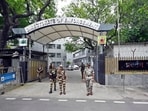 Security personnel stand guard outside the Enforcement Directorate (ED) office in New Delhi. Security personnel stand guard outside the Enforcement Directorate (ED) office in New Delhi.