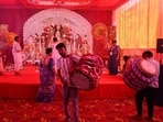 Dakhis performs during Maha Saptami Aarti in Sector 46’s Sahashrabdi Samity. (Parveen Kumar/HT)