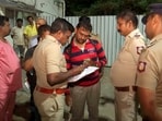 Police personnel at the site after an under-construction building collapses, in Chennai, Tuesday