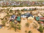 An aerial photo shows flood waters surrounding homes after typhoon Bualoi passed over Lam Thanh commune in Nghe An province, Vietnam