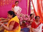 Women at Gomti Nagar Durga Puja committee (HT Photo)