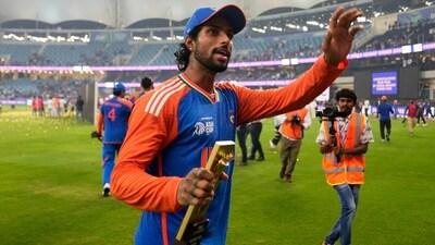 India's Tilak Varma greets fans after India won the Asia Cup cricket final against Pakistan at Dubai International Cricket Stadium, United Arab Emirates, Sunday, Sept. 28, 2025. (AP Photo/Altaf Qadri) (AP)