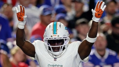 Tyreek Hill of the Miami Dolphins celebrates after scoring a touchdown in the fourth quarter of the game against the Buffalo Bills. (Getty Images via AFP) Tyreek Hill of the Miami Dolphins celebrates after scoring a touchdown in the fourth quarter of the game against the Buffalo Bills. (Getty Images via AFP)