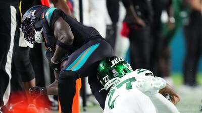 Miami Dolphins wide receiver Tyreek Hill (10) injuries his leg against the New York Jets during the second half at Hard Rock Stadium. (Rich Storry-Imagn Images via Reuters Connect)