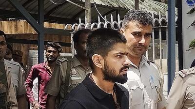 Gangster Lawrence Bishnoi at Patiala House Court in New Delhi. (PTI) Gangster Lawrence Bishnoi at Patiala House Court in New Delhi. (PTI)