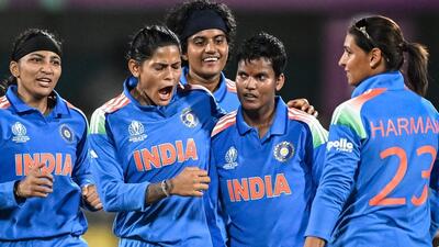 India's Deepti Sharma (2R) celebrates with teammates after dismissing Sri Lanka captain Chamari Athapaththu in the opening Women’s World Cup game in Guwahati on Tuesday. Deepti hit 53 and took 3/54. (AFP) India's Deepti Sharma (2R) celebrates with teammates after dismissing Sri Lanka captain Chamari Athapaththu in the opening Women’s World Cup game in Guwahati on Tuesday. Deepti hit 53 and took 3/54. (AFP)