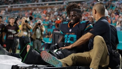 Miami Dolphins wide receiver Tyreek Hill (10) reacts after being placed on a medical cart against the New York Jets (IMAGN IMAGES via Reuters Connect)