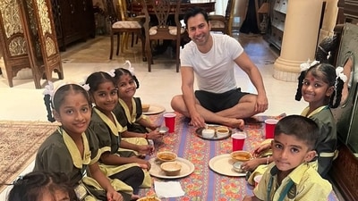 Varun Dhawan with kids at his home for kanya pujan on Durga Ashtami. Varun Dhawan with kids at his home for kanya pujan on Durga Ashtami.