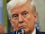 President Donald Trump looks on as he announces a deal with Pfizer to sell drugs at lower prices