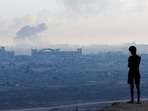 Smoke rose from Gaza City on Wednesday. Smoke rose from Gaza City on Wednesday.