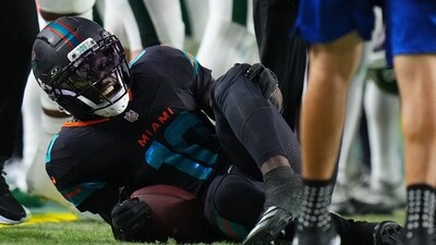 Miami Dolphins wide receiver Tyreek Hill (10) injuries his leg. (IMAGN IMAGES via Reuters Connect)