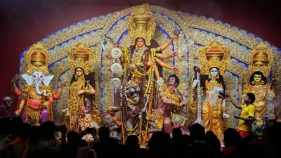 Navratri colours 2025: A priest worship an idol of goddess Durga on the second day of Hindu festival Durga Puja at a makeshift worsip venue, in Kolkata, India, Tuesday, Sept. 30, 2025. (AP Photo/Bikas Das) (AP) Navratri colours 2025: A priest worship an idol of goddess Durga on the second day of Hindu festival Durga Puja at a makeshift worsip venue, in Kolkata, India, Tuesday, Sept. 30, 2025. (AP Photo/Bikas Das) (AP)
