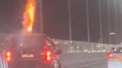 Screengrab from the video showing firecrackers from the roof of the vehicle. (HT) Screengrab from the video showing firecrackers from the roof of the vehicle. (HT)