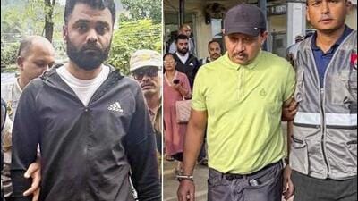 Shyamkanu Mahanata (right) and Siddhartha Sharma being brought to the CID office, Guwahati, Assam, on Wednesday. (PTI Photos) Shyamkanu Mahanata (right) and Siddhartha Sharma being brought to the CID office, Guwahati, Assam, on Wednesday. (PTI Photos)