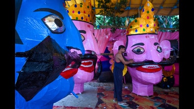 The ceremonial burning (Dahan) starts at 7 pm. The main effigies at the Sector 62 ground are Raavan (70 ft), Kumbhakarn (65 ft) and Meghanath (60 ft), which will be incinerated along with three smaller, 10-foot effigies representing women’s oppression, inflation, and Pakistan state-sponsored terrorism. (Sunil Ghosh/HT Photo) The ceremonial burning (Dahan) starts at 7 pm. The main effigies at the Sector 62 ground are Raavan (70 ft), Kumbhakarn (65 ft) and Meghanath (60 ft), which will be incinerated along with three smaller, 10-foot effigies representing women’s oppression, inflation, and Pakistan state-sponsored terrorism. (Sunil Ghosh/HT Photo)