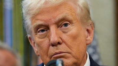 President Donald Trump looks on as he announces a deal with Pfizer to sell drugs at lower prices (REUTERS)