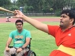 Amit Saroha (left) trains F51 club thrower Dharambir