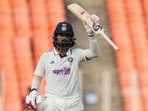 India's KL Rahul celebrates after scoring fifty.