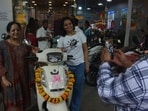 As the festival is also considered an auspicious time for purchasing new vehicles occasion of Dashera Vijaya Dashami , several showrooms in Thane witnessed crowds of citizens buying two-wheelers at panchpakhadi Thane. ( Praful Gangurde / HT Photo )