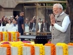 Prime Minister Narendra Modi pays homage to Mahatma Gandhi on his birth anniversary at Rajghat in New Delhi.