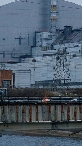 A general view shows the New Safe Confinement (NSC) structure over the old sarcophagus covering the damaged fourth reactor at the Chernobyl Nuclear Power Plant in Chernobyl. (REUTERS)