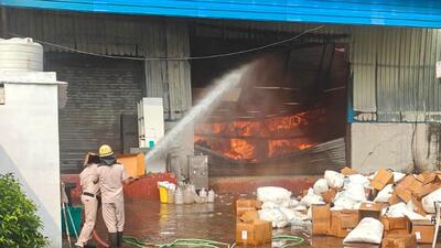 Firefighters dousing the fire. (HT ) Firefighters dousing the fire. (HT )