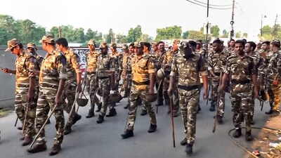 Security personnel walk past during a route march on the eve of the Dussehra festival, in Bareilly, Uttar Pradesh, Wednesday, Oct. 1, 2025. (PTI) Security personnel walk past during a route march on the eve of the Dussehra festival, in Bareilly, Uttar Pradesh, Wednesday, Oct. 1, 2025. (PTI)