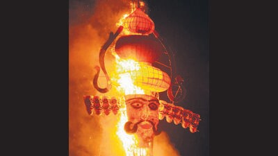 The tricity’s tallest Ravana effigy, which was put to flames, at Shalimar Ground, Sector 5, Panchkula, on Thursday. (Sant Arora/HT)