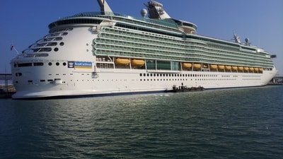 Norovirus outbreak sickens passengers on Royal Caribbean cruise, docking at PortMiami. (Representative Image: Unsplash) Norovirus outbreak sickens passengers on Royal Caribbean cruise, docking at PortMiami. (Representative Image: Unsplash)