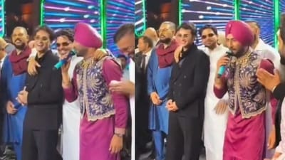 Yuvraj Singh and Abhishek Sharma on stage with singer Ranjit Bawa Yuvraj Singh and Abhishek Sharma on stage with singer Ranjit Bawa