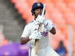 India's Dhruv Jurel celebrates after scoring a century on the second day of the first Test match.